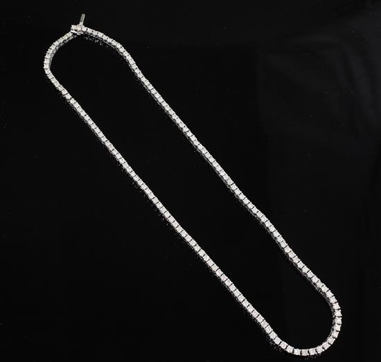 A modern 14ct white gold and diamond tennis necklace, 42cm.